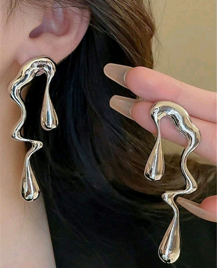 Pendientes Asimétricos
