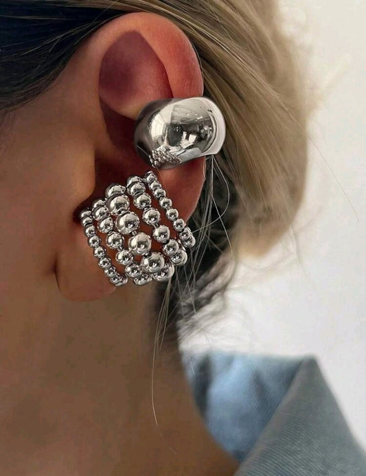 Abrazadera de oreja