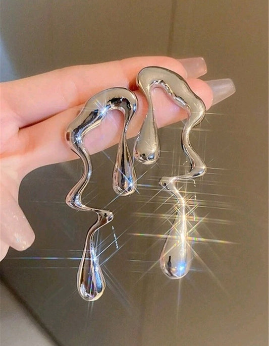 Pendientes Asimétricos