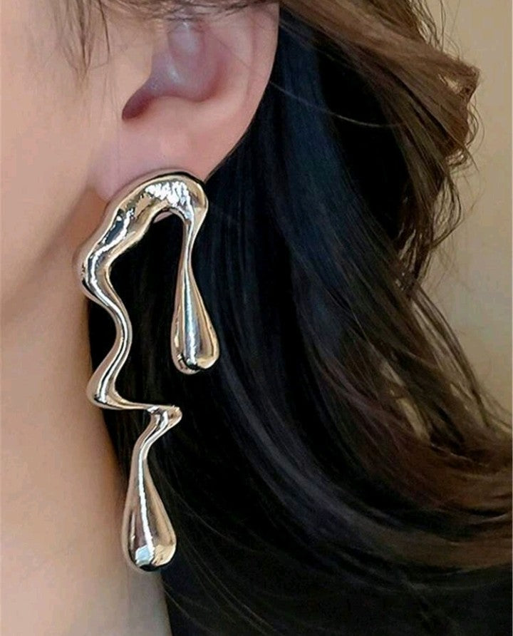 Pendientes Asimétricos